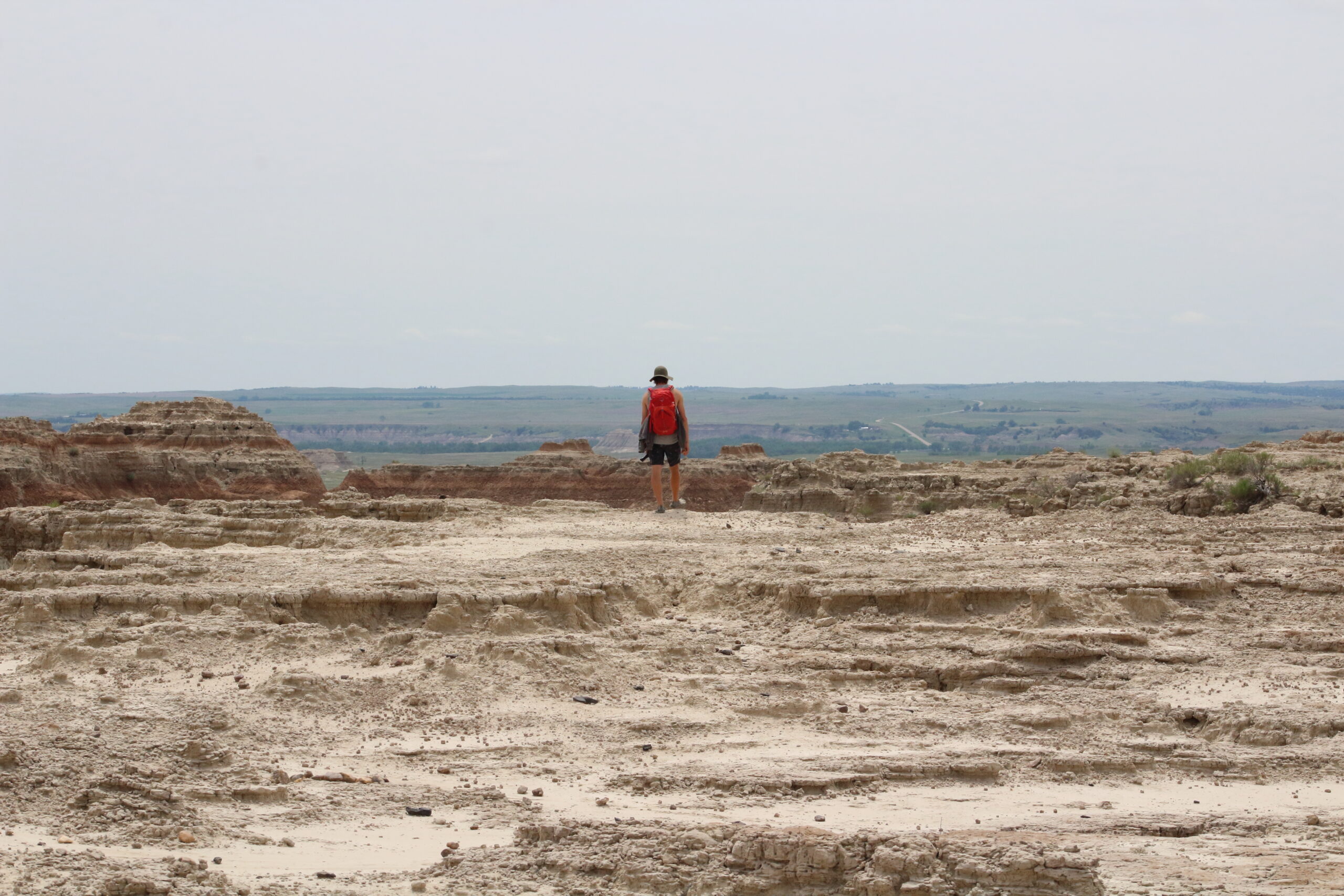 Lone Hiker In The Badlands